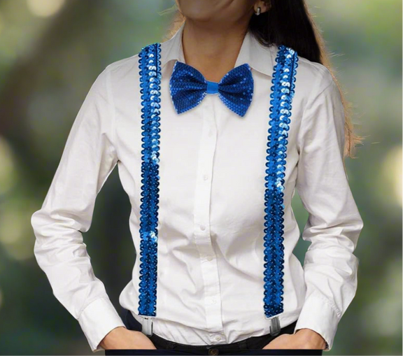 Blue sequin suspenders with Y-back design and silver clips displayed on a light wooden surface.