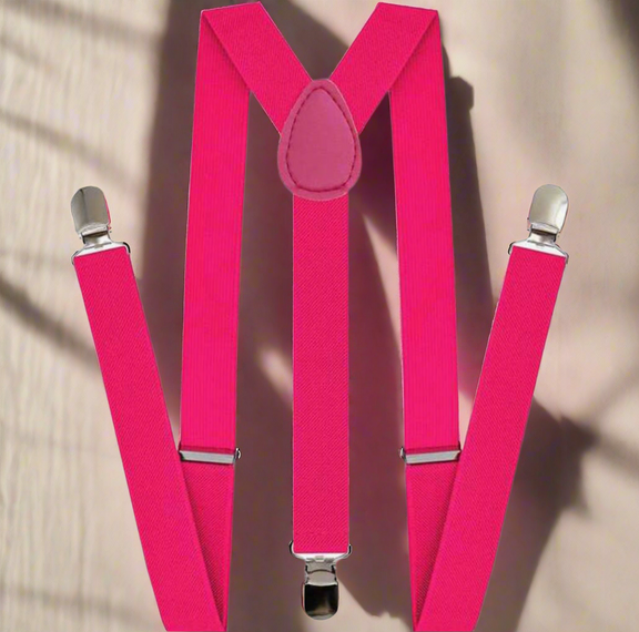 Bright hot pink unisex suspenders with Y-back design and silver clips displayed on white background.