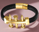 Men’s faux leather braided bracelet with gold-tone bolt centerpiece and magnetic clasp displayed on white background.