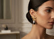 “Afia Orchid” statement earrings in radiant gold and floral design — inspired by the strength and beauty of the orchid flower. A perfect accessory that symbolizes grace, resilience, and feminine power.