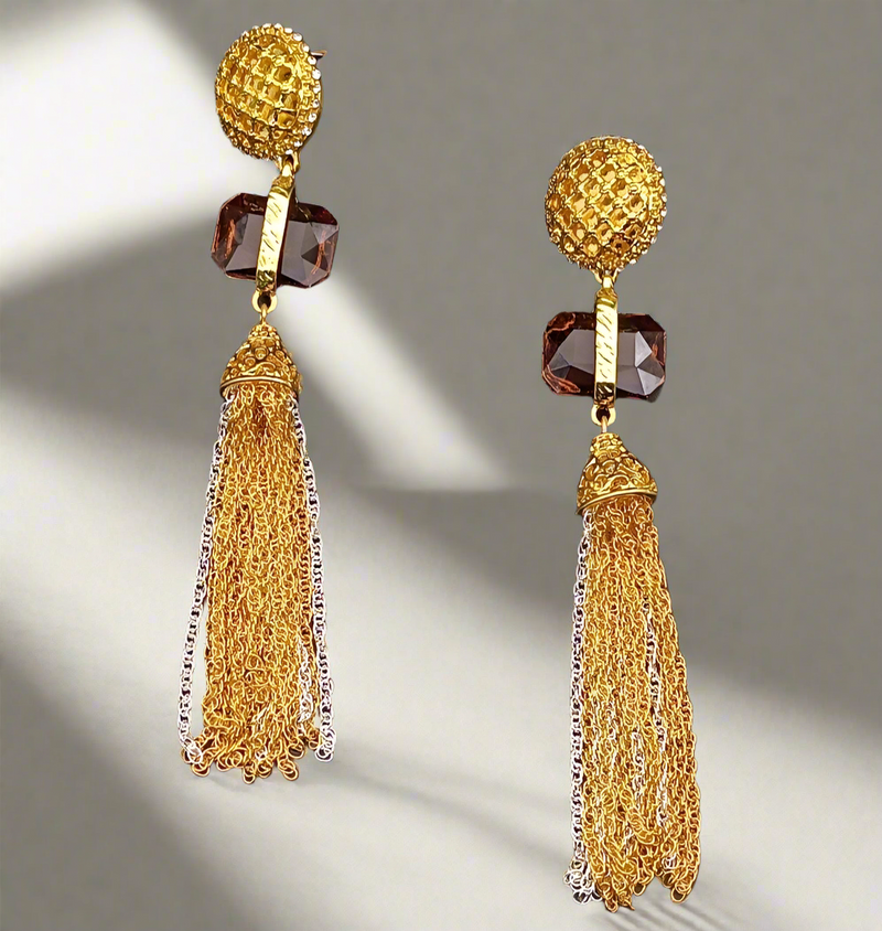 Adira Royal Tassel Earrings featuring a textured gold stud, brown gemstone, and elegant cascading gold and silver tassels – a bold and luxurious statement piece.