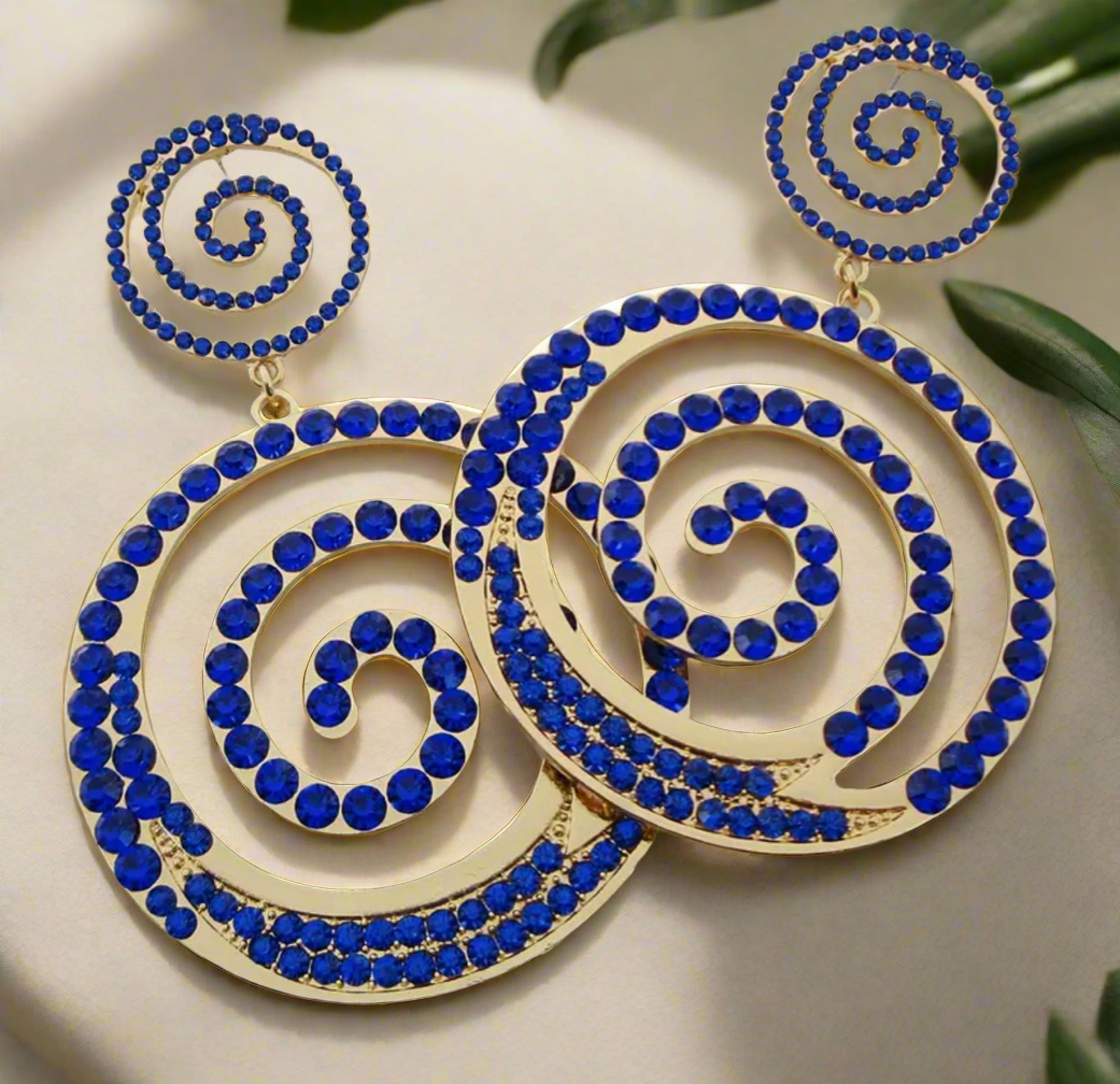 Large turquoise spiral rhinestone statement earrings on gold base — bold dangle earrings with double swirl design, perfect for evening glamour or stylish everyday looks
