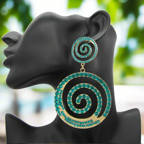 Large turquoise spiral rhinestone statement earrings on gold base — bold dangle earrings with double swirl design, perfect for evening glamour or stylish everyday looks