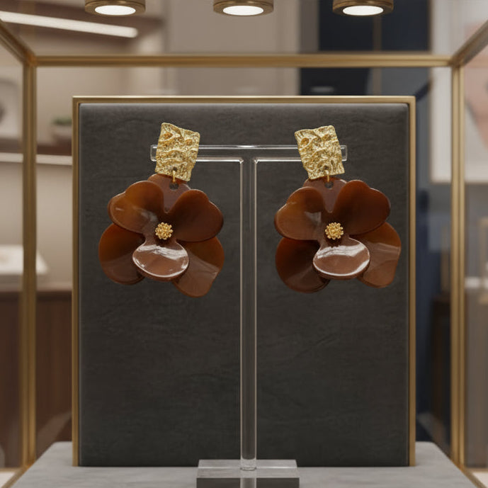 Ayira Amber brown flower-shaped statement earrings with gold textured top studs, elegant floral resin design reflecting warm sunset hues