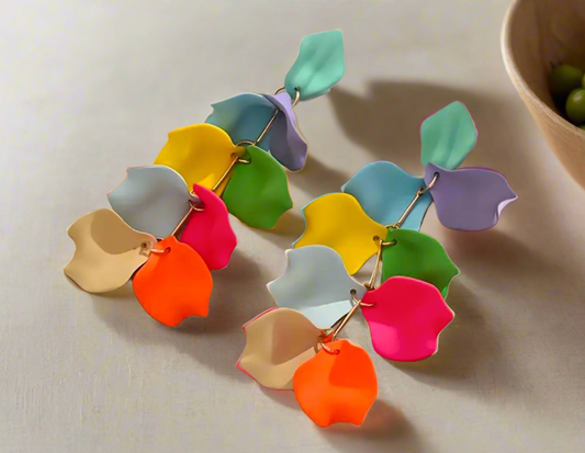 Bright and colorful multicolor floral petal drop earrings featuring stacked polymer clay petals in mint, lavender, green, yellow, pink, and orange. Perfect statement earrings for spring or Easter.
