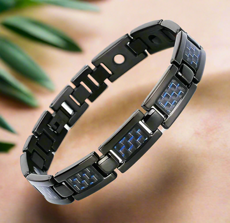 Black stainless steel link bracelet with blue carbon fiber inlays and magnetic accents, displayed on white background.