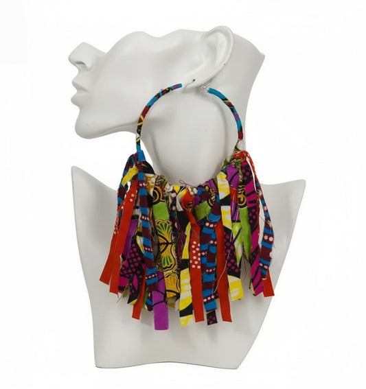 Colorful African print earrings on a white mannequin head
