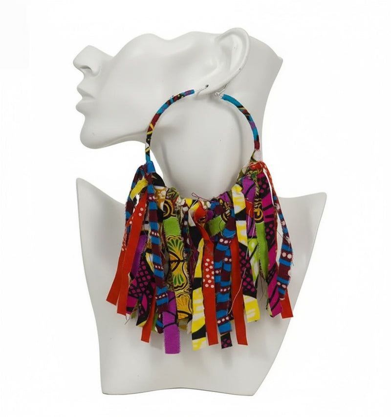 Colorful African print earrings on a white mannequin head