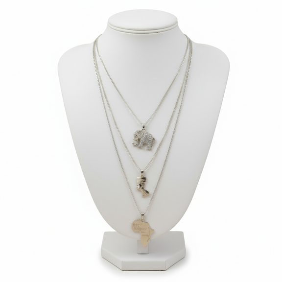 Necklace with elephant pendant on a white mannequin bust