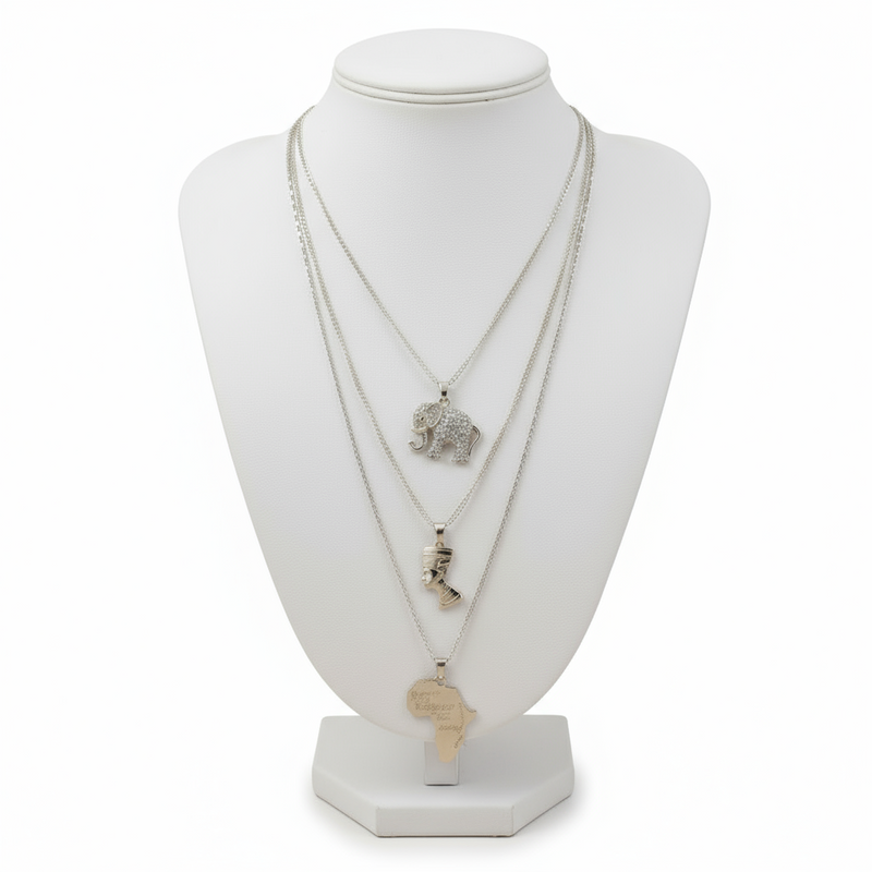 Necklace with elephant pendant on a white mannequin bust
